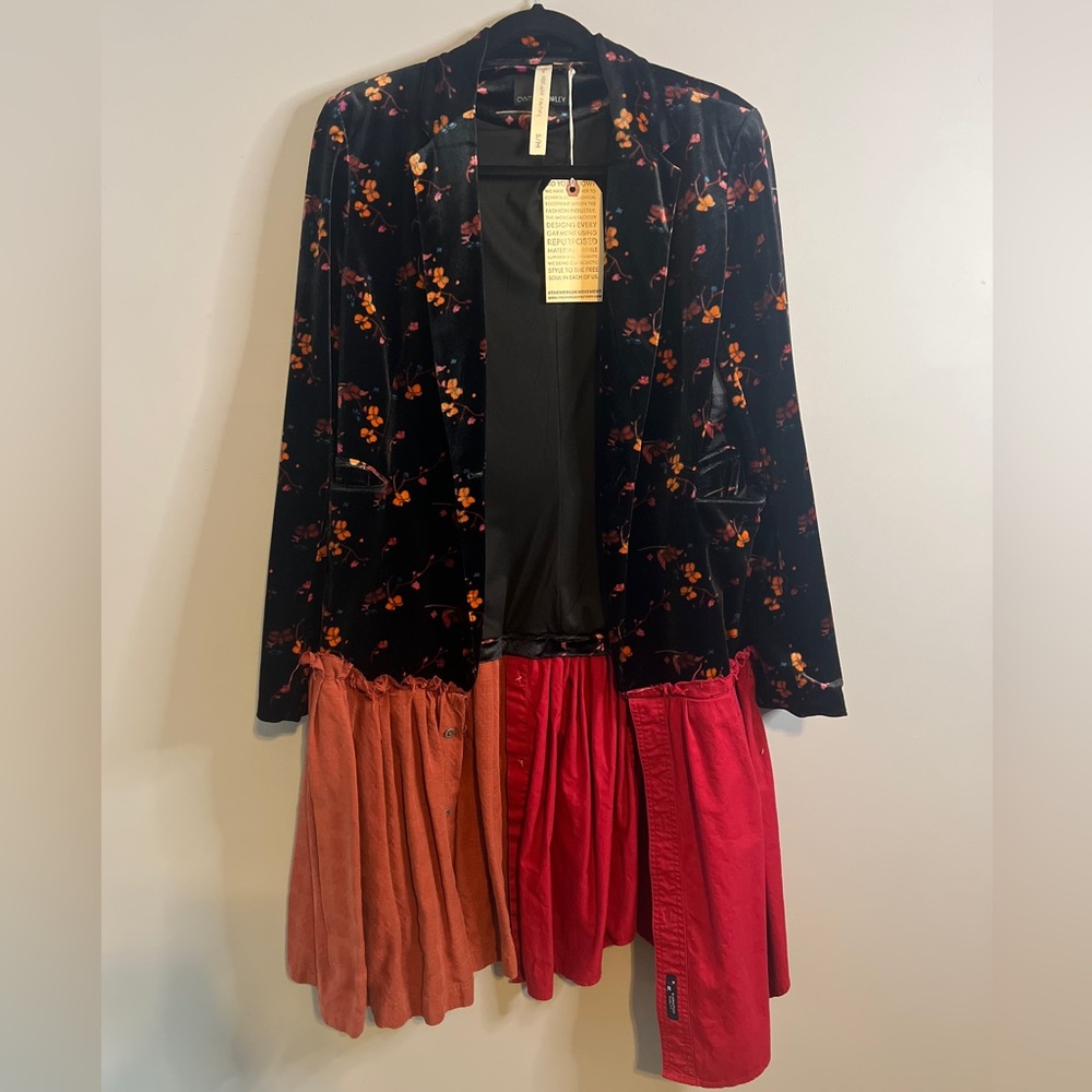 Beautiful blazer. Dress it up or down. One of a kind piece. Fits S/M.